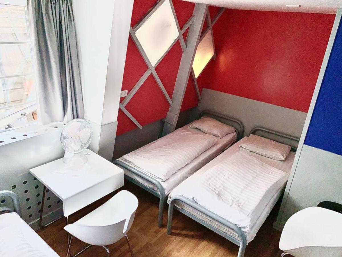 Habitación Triple con baño compartido