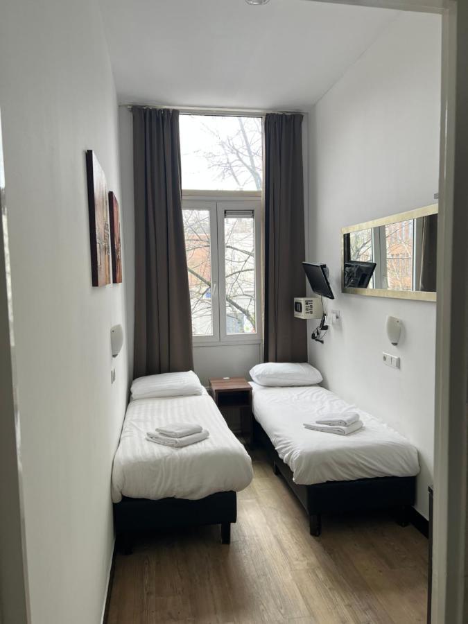 Tweepersoonskamer met 2 Aparte Bedden
